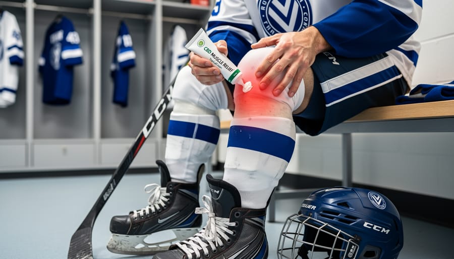 Athlete applying CBD topical cream to shoulder muscles in locker room setting